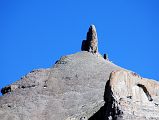 08 Lingam Shaped Rock On Western Wall Of Kailash On Mount Kailash Inner Kora Nandi Parikrama After cresting the ridge above the confluence of the two dry rivers, a lingam-shaped rock protrudes from the west wall of the Mount Kailash Inner Kora (08:28).